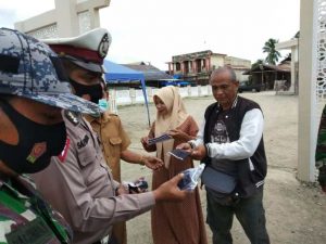 Polres Aceh Besar Gelar Operasi Yustisi Gunakan Masker Bersama TNI, Sat Pol PP dan WH, Cegah Covid-19